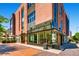 Eileen Fisher store with large display windows and brick sidewalk at 275 S Harrison St # 302, Denver, CO 80209