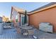 Backyard patio with seating area and grill at 12955 Vallejo Cir, Westminster, CO 80234