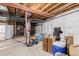 Unfinished basement area with storage and utilities at 12955 Vallejo Cir, Westminster, CO 80234