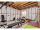 Partially finished basement gym with exercise equipment at 12955 Vallejo Cir, Westminster, CO 80234