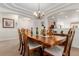 Formal dining room, featuring a wood table and chairs at 12955 Vallejo Cir, Westminster, CO 80234