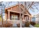 Home's exterior, featuring a welcoming front porch at 12955 Vallejo Cir, Westminster, CO 80234