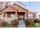 House exterior showcasing a charming front porch at 12955 Vallejo Cir, Westminster, CO 80234