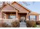 Craftsman style home with front porch and landscaping at 12955 Vallejo Cir, Westminster, CO 80234