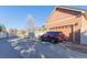 Attached garage with parking and driveway at 12955 Vallejo Cir, Westminster, CO 80234