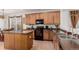 Well-equipped kitchen featuring a large island and double sink at 12955 Vallejo Cir, Westminster, CO 80234