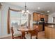 Kitchen breakfast nook with a round table and chairs at 12955 Vallejo Cir, Westminster, CO 80234
