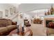 Spacious living room features a fireplace and ample natural light at 12955 Vallejo Cir, Westminster, CO 80234