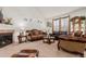 Bright living room with a fireplace and comfortable seating at 12955 Vallejo Cir, Westminster, CO 80234