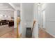 Elegant staircase leading to the lower level at 12955 Vallejo Cir, Westminster, CO 80234
