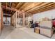 Unfinished basement area with storage boxes at 12955 Vallejo Cir, Westminster, CO 80234