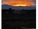 Mountain sunset view from a rural property at 3647 County Road 19, Fort Lupton, CO 80621