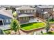 Aerial view of house, showcasing backyard and landscaping at 1061 Equinox Ln, Erie, CO 80516