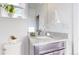 Clean bathroom with granite countertop and single sink vanity at 1061 Equinox Ln, Erie, CO 80516