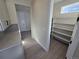 Pantry area with white shelves, providing ample storage space at 5723 Farrier Pt, Castle Rock, CO 80104