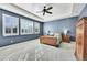 Large main bedroom with carpeted floors and window seating at 14672 Melco Ave, Parker, CO 80134