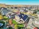Aerial perspective of a house with solar panels and backyard at 14672 Melco Ave, Parker, CO 80134