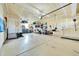 Organized garage with overhead storage and ample space at 14672 Melco Ave, Parker, CO 80134