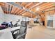 Unfinished basement area with gym and storage space at 14672 Melco Ave, Parker, CO 80134