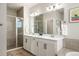 Spa-like bathroom with double sinks and a large shower at 728 Larkspur Ct, Brighton, CO 80601