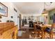 Bright dining room with a view into the living room and kitchen at 8104 El Jebel Loop, Castle Rock, CO 80108