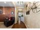 Spacious entryway with hardwood floors and rustic decor at 8104 El Jebel Loop, Castle Rock, CO 80108