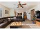 Open living room with a view into the kitchen and dining area at 8104 El Jebel Loop, Castle Rock, CO 80108