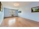 Bright bedroom with hardwood floors and window at 9655 E Center Ave # 6D, Denver, CO 80247