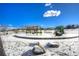 Playground with various play equipment surrounded by snow at 11597 N Settlers Dr, Parker, CO 80138