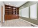 Office with built-in shelving and window seating at 29850 E 167Th Pl, Brighton, CO 80603