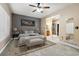 Main bedroom with sitting area and access to bathroom at 29850 E 167Th Pl, Brighton, CO 80603