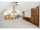 Bonus room with built-in storage and lofted ceilings at 29850 E 167Th Pl, Brighton, CO 80603