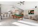 Game room with pool table, bar and seating area at 29850 E 167Th Pl, Brighton, CO 80603