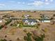 Aerial view of the house and surrounding neighborhood at 29850 E 167Th Pl, Brighton, CO 80603