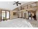 Spacious living room with high ceilings and a loft at 29850 E 167Th Pl, Brighton, CO 80603