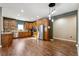 Kitchen with stainless steel appliances and wood cabinets at 29850 E 167Th Pl, Brighton, CO 80603