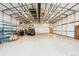 Spacious interior shop with high ceilings, concrete floor, and shelving at 29850 E 167Th Pl, Brighton, CO 80603