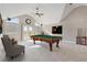 Game room with pool table and access to balcony at 29850 E 167Th Pl, Brighton, CO 80603