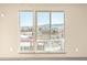 Bedroom view of snow covered mountain neighborhood at 12983 W Ida Ave # 317, Littleton, CO 80127