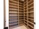 Large walk-in pantry with ample shelving for storage at 2200 Newton St, Denver, CO 80211