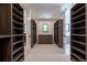 Spacious walk-in closet with ample shelving and drawers at 2200 Newton St, Denver, CO 80211
