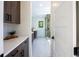 Clean bathroom with double vanity and walk-in shower at 2200 Newton St, Denver, CO 80211