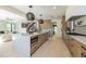 Modern kitchen with large island and stainless steel appliances at 2200 Newton St, Denver, CO 80211