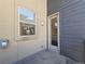 Small balcony with exterior access and storage at 6435 E Cedar Ave, Denver, CO 80224