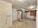 Unfinished basement with HVAC and plumbing at 6435 E Cedar Ave, Denver, CO 80224