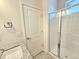 Clean bathroom with a walk-in shower and granite vanity at 6435 E Cedar Ave, Denver, CO 80224