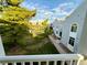 View of a residential courtyard with green space at 3414 S Locust St # D, Denver, CO 80222