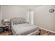 Bright bedroom with a comfortable queen bed at 9901 E Evans Ave # 7D, Aurora, CO 80247