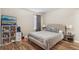 Cozy bedroom with a queen-size bed and ample closet space at 9901 E Evans Ave # 7D, Aurora, CO 80247