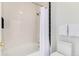Clean bathroom with shower/tub combo and subway tile at 8200 E 8Th Ave # 8101, Denver, CO 80230